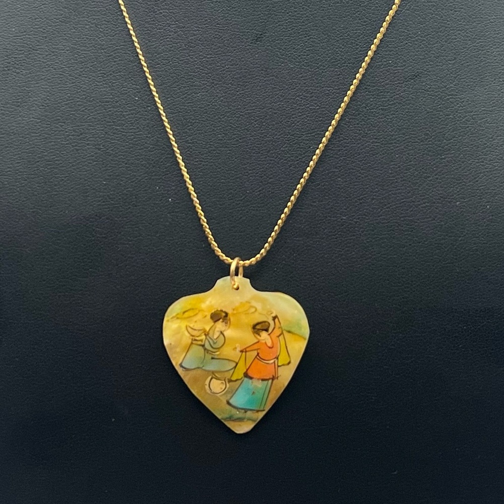 Antique Gold Heart Necklace with Artistic Design